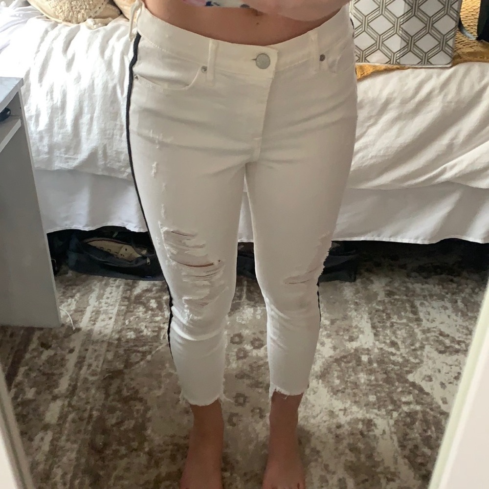 White jeans with black stripe down the sides